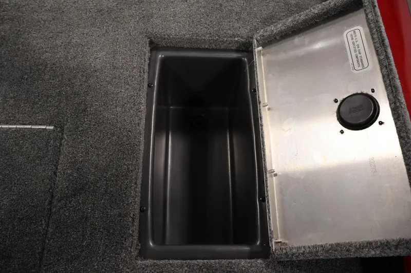 Slide: The Image of 2024 Tracker Pro Team 175 TXW storage compartment with open lid, showcasing interior space. - 25