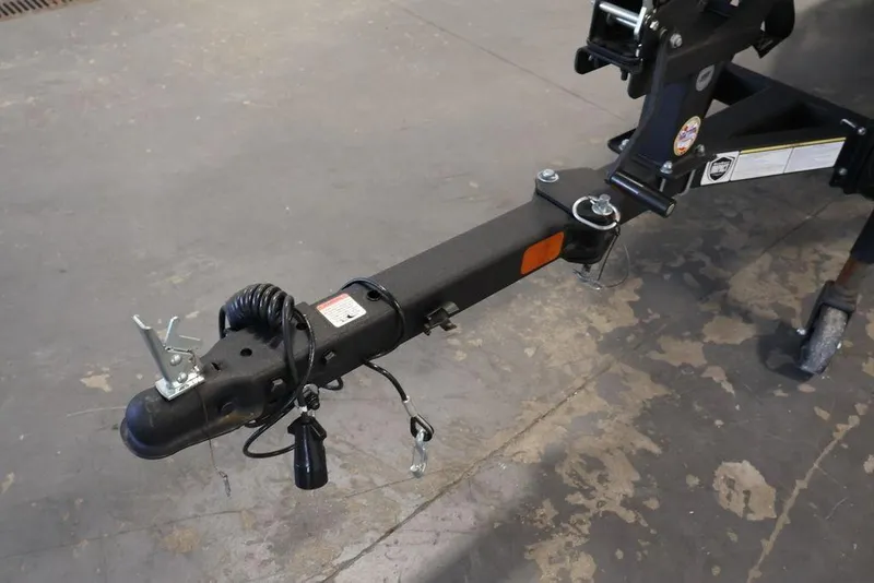 Slide: The Image of Trailer hitch of 2024 Tracker Pro Team 175 TXW boat on concrete floor. - 41