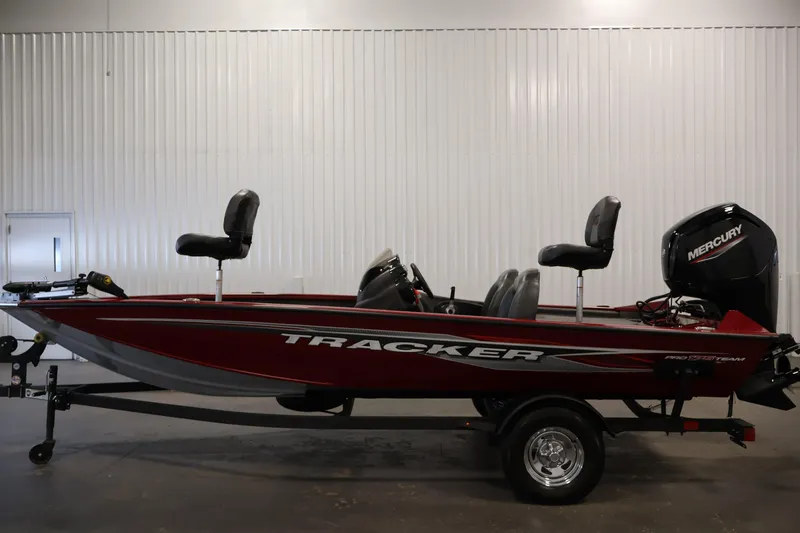 Slide: The Image of 2024 Tracker Pro Team 175 TXW boat with Mercury engine, side view in a showroom. - 7