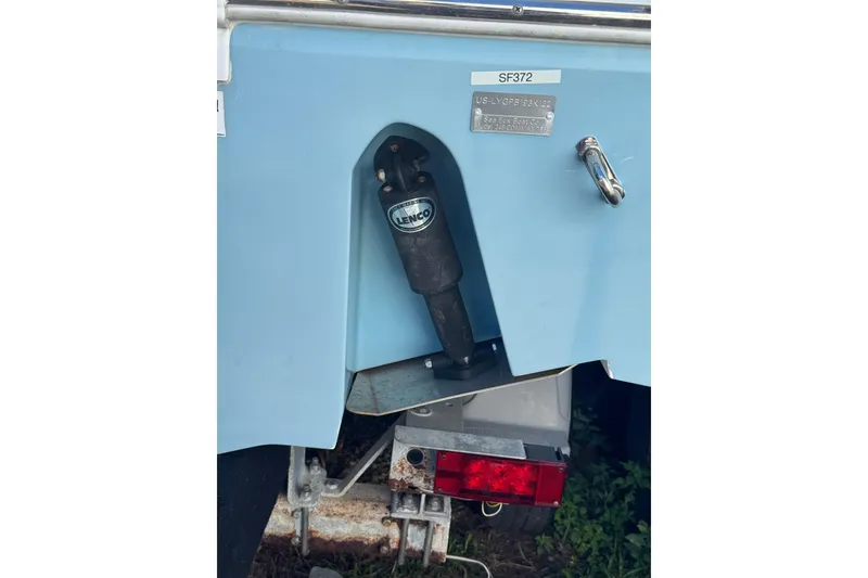 Slide: The Image of 2022 Sea Fox 248 Commander boat stern with Lenco trim tab and trailer light. - 22