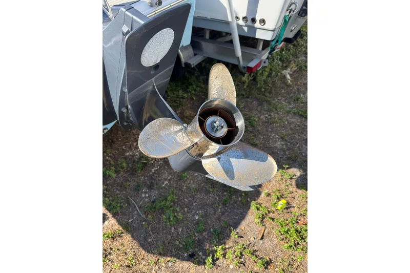 Slide: The Image of Propeller of 2022 Sea Fox 248 Commander boat on grassy ground. - 23