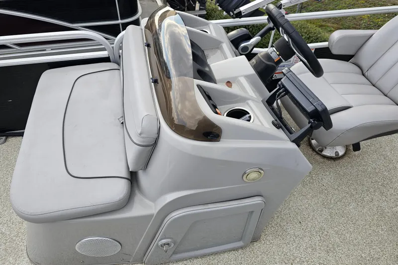 Slide: The Image of 2020 Bennington SV 20 SFV boat console with steering wheel and seating. - 11