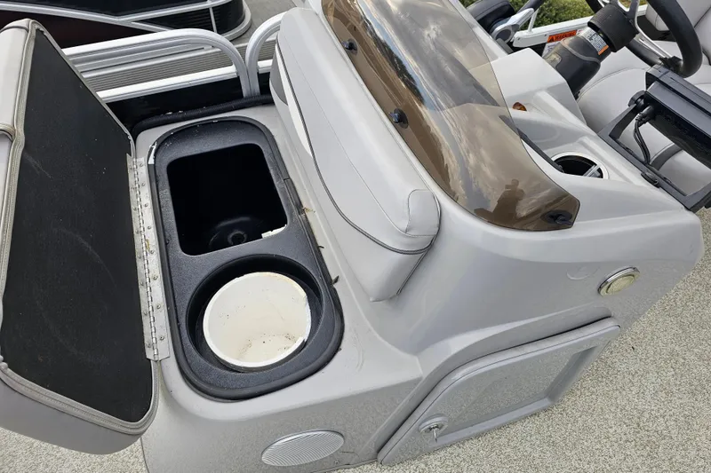 Slide: The Image of 2020 Bennington SV 20 SFV boat console with storage compartment and cup holders. - 12