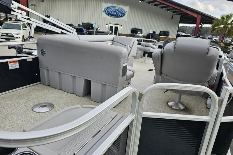 Slide: The Image of 2020 Bennington SV 20 SFV pontoon boat interior with gray seating and open deck. - 5