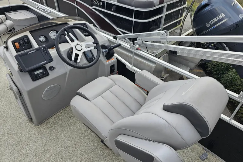 Slide: The Image of 2020 Bennington SV 20 SFV boat interior with steering wheel and control panel. - 8