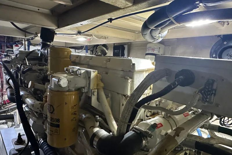 Slide: The Image of 2000 Grand Banks 43 Eastbay FB yacht docked in a covered marina. - 11