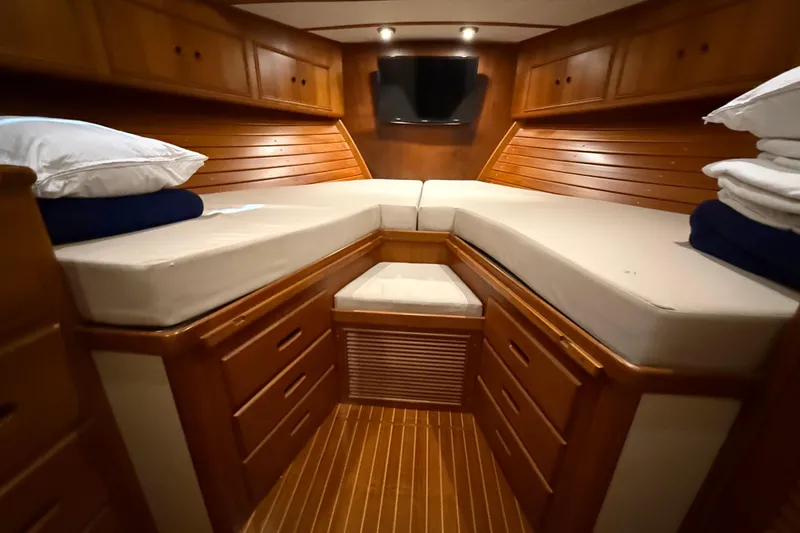 Slide: The Image of Luxurious cabin interior of 2000 Grand Banks 43 Eastbay FB yacht with wooden finish. - 117