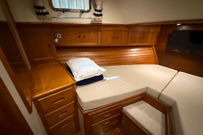 Slide: The Image of Luxurious wooden cabin interior of 2000 Grand Banks 43 Eastbay FB yacht. - 118