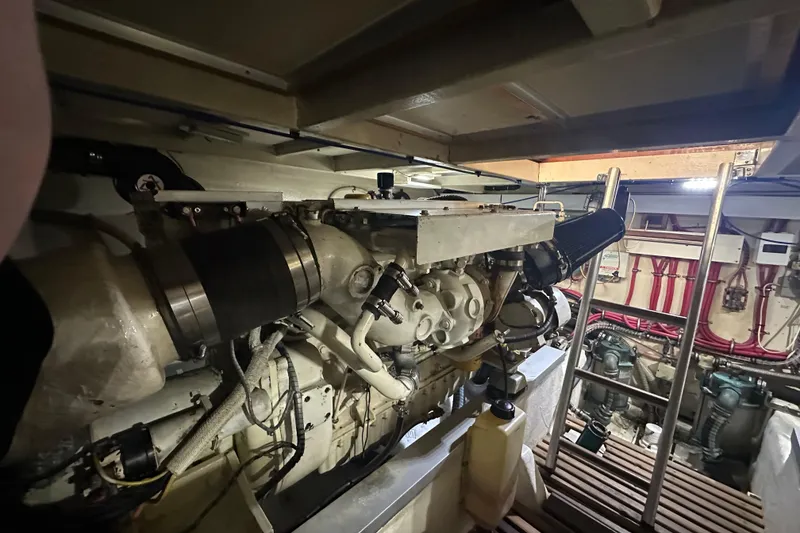 Slide: The Image of 2000 Grand Banks 43 Eastbay FB yacht docked in a covered marina. - 12