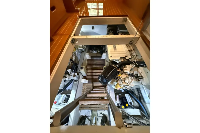 Slide: The Image of Engine room of 2000 Grand Banks 43 Eastbay FB with visible machinery and components. - 124