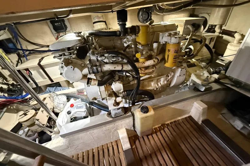 Slide: The Image of Engine room of 2000 Grand Banks 43 Eastbay FB with visible machinery and components. - 132