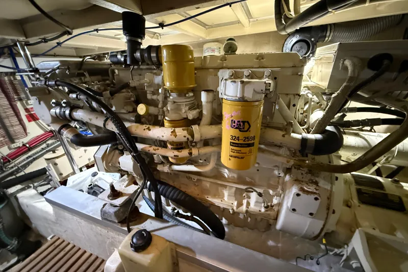 Slide: The Image of Engine room of 2000 Grand Banks 43 Eastbay FB with visible machinery and components. - 133