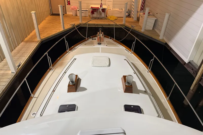 Slide: The Image of 2000 Grand Banks 43 Eastbay FB docked in a covered marina. - 26