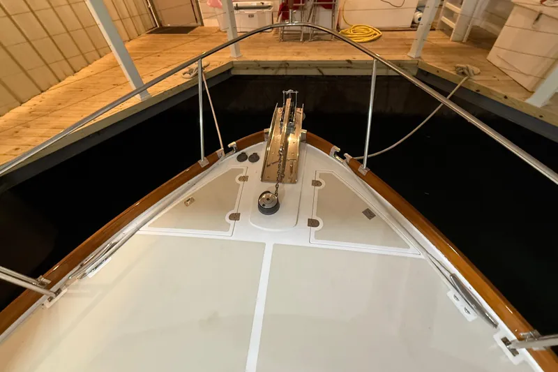 Slide: The Image of Bow view of 2000 Grand Banks 43 Eastbay FB docked in a marina. - 27