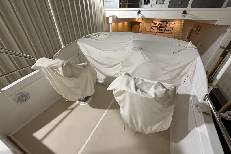 Slide: The Image of Covered seating area on a 2000 Grand Banks 43 Eastbay FB yacht. - 45