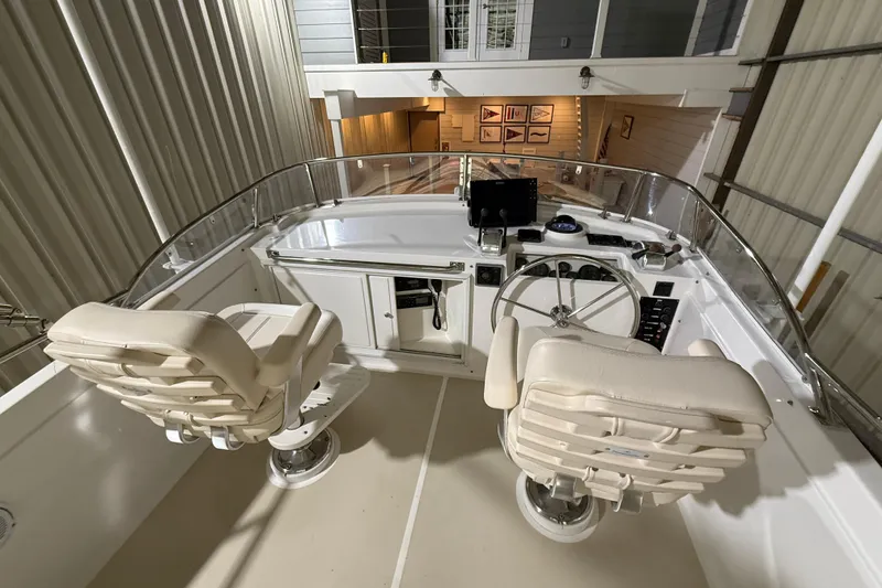 Slide: The Image of 2000 Grand Banks 43 Eastbay FB helm with dual seats and navigation equipment. - 47