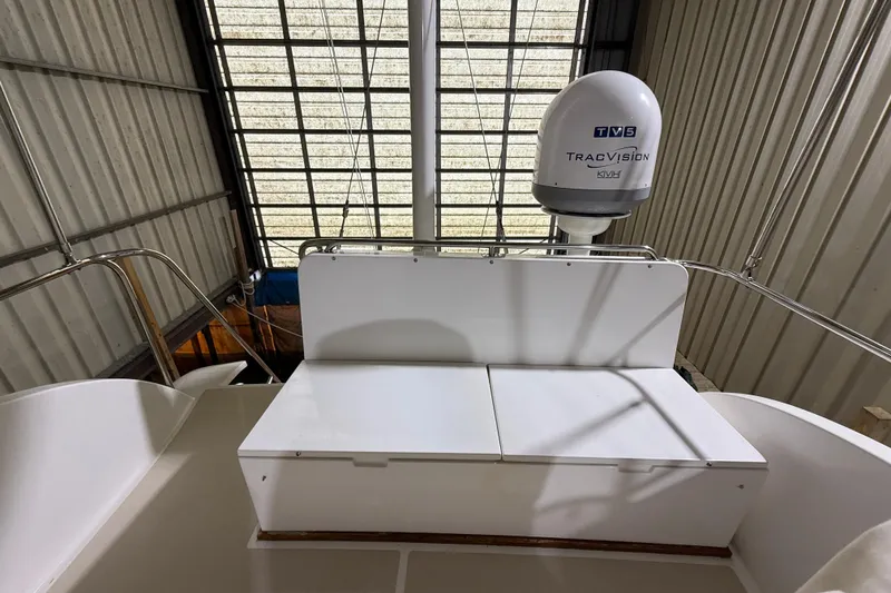 Slide: The Image of 2000 Grand Banks 43 Eastbay FB with TracVision satellite, docked indoors. - 50