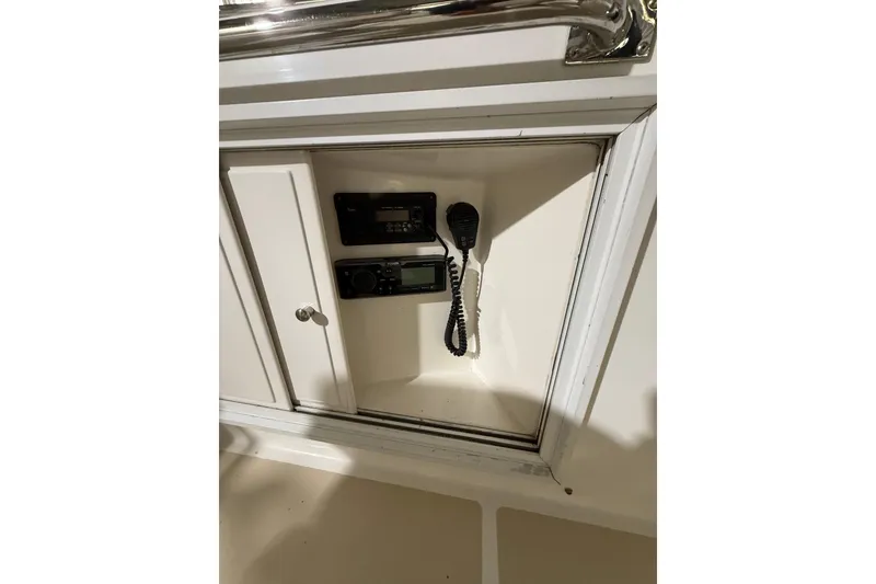 Slide: The Image of Radio equipment in a 2000 Grand Banks 43 Eastbay FB yacht compartment. - 51