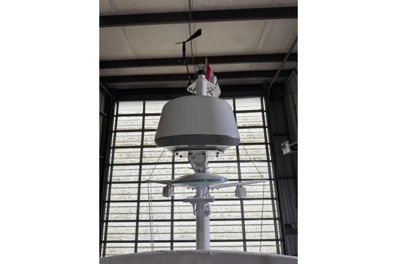 Slide: The Image of Radar equipment on a 2000 Grand Banks 43 Eastbay FB yacht in a storage facility. - 53