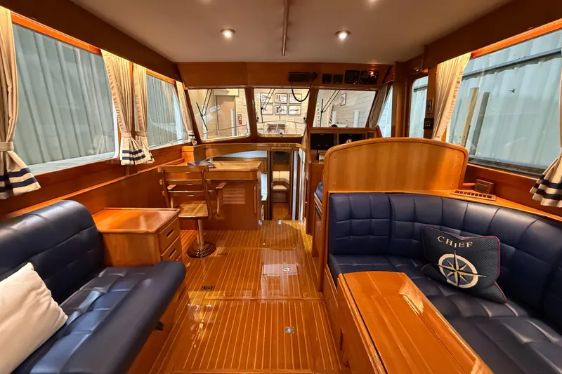 Slide: The Image of Luxurious interior of 2000 Grand Banks 43 Eastbay FB yacht with elegant wood and leather finishes. - 55