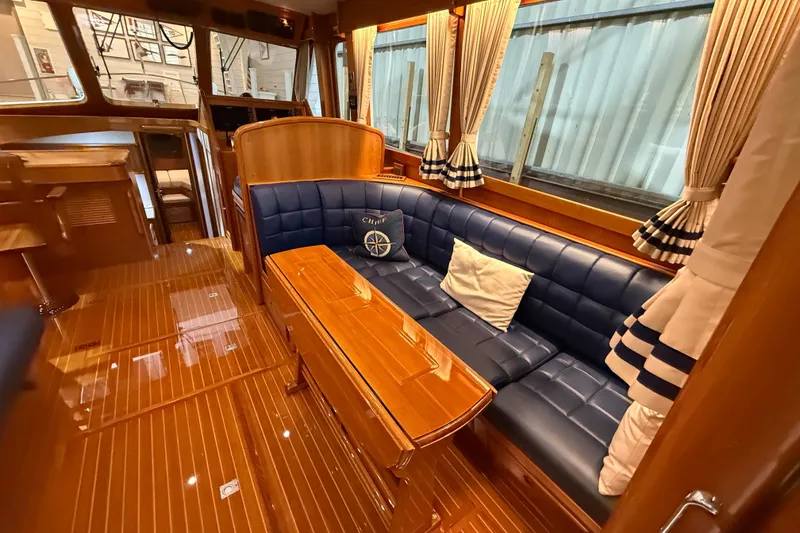 Slide: The Image of Luxurious interior of 2000 Grand Banks 43 Eastbay FB yacht with elegant wood and leather seating. - 56