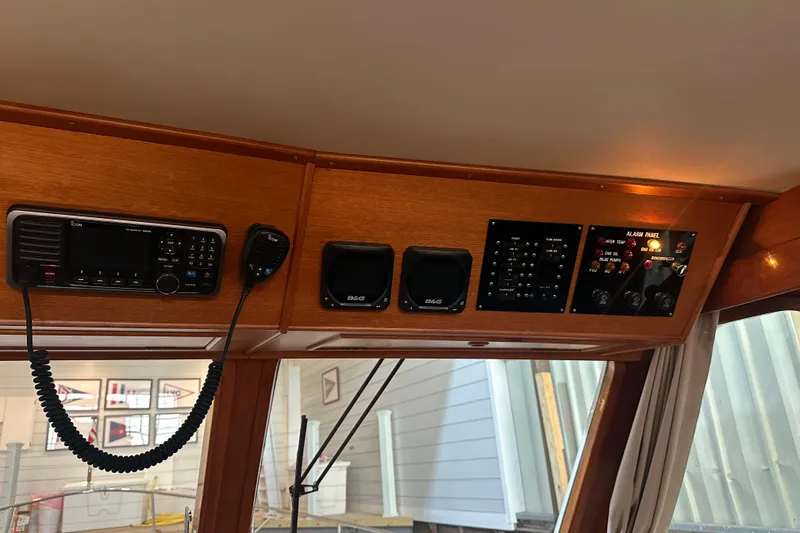 Slide: The Image of 2000 Grand Banks 43 Eastbay FB yacht docked in a covered marina. - 6