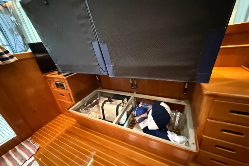Slide: The Image of Storage compartment in 2000 Grand Banks 43 Eastbay FB yacht interior. - 64