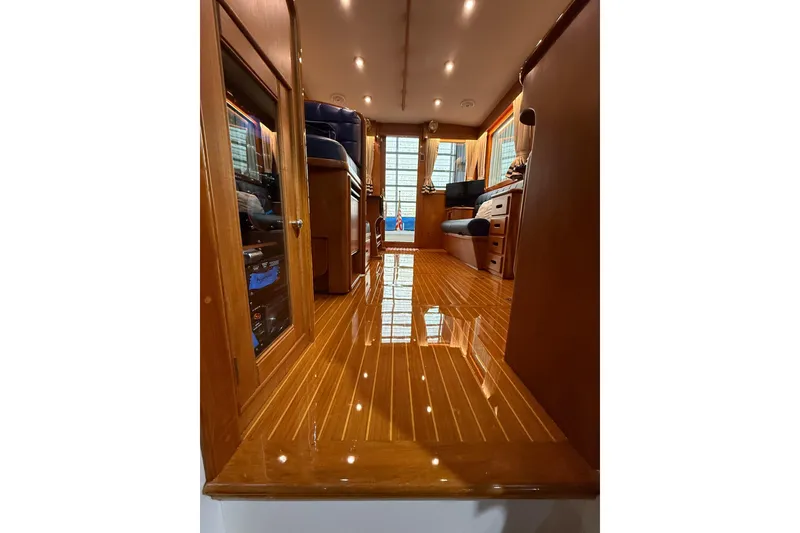 Slide: The Image of Luxurious interior of 2000 Grand Banks 43 Eastbay FB yacht with polished wood flooring. - 88