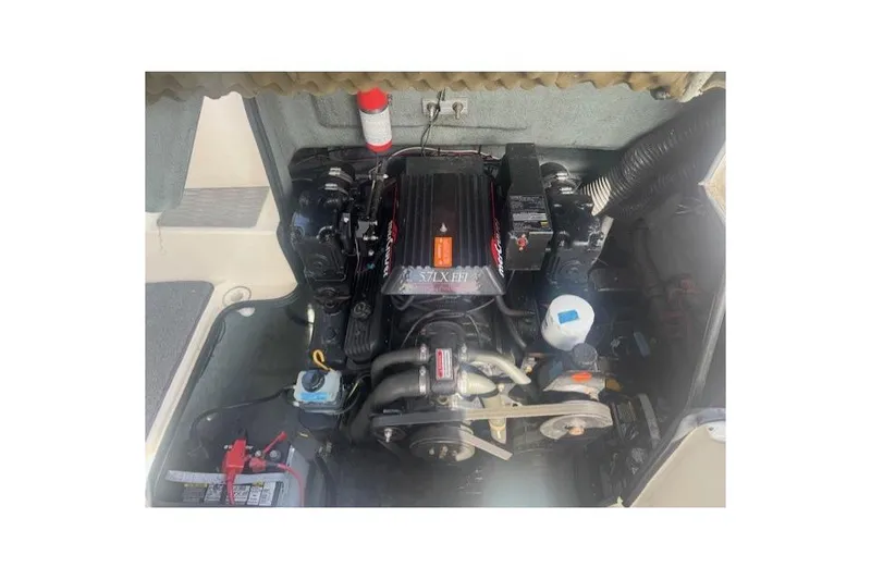 Slide: The Image of Engine compartment of a 1997 Sea Ray 240 Sundeck boat. - 9