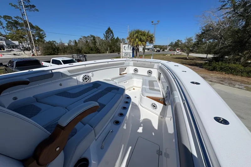 Slide: The Image of 2027 Caymas 401 CC boat interior with luxurious seating and modern design features. - 15