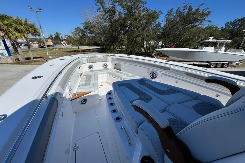 Slide: The Image of Luxurious 2027 Caymas 401 CC boat interior with plush seating and modern design. - 17