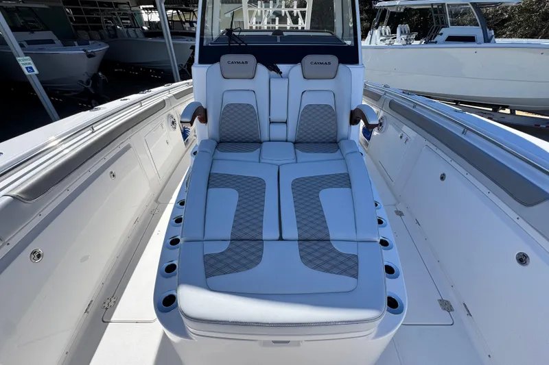 Slide: The Image of 2027 Caymas 401 CC boat interior with luxurious seating and modern design. - 21