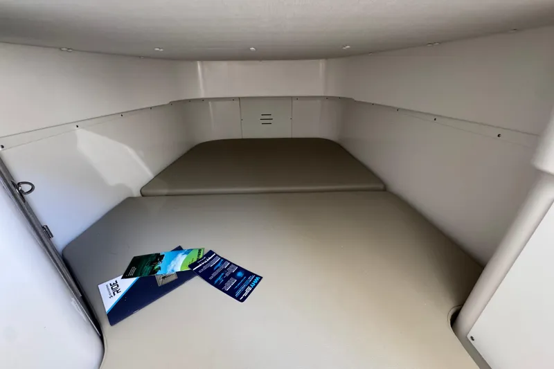 Slide: The Image of Interior cabin of 2027 Caymas 401 CC boat, featuring a spacious, minimalist design. - 32