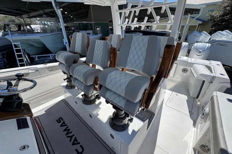 Slide: The Image of Luxury seating on 2027 Caymas 401 CC boat, featuring elegant design and premium materials. - 33