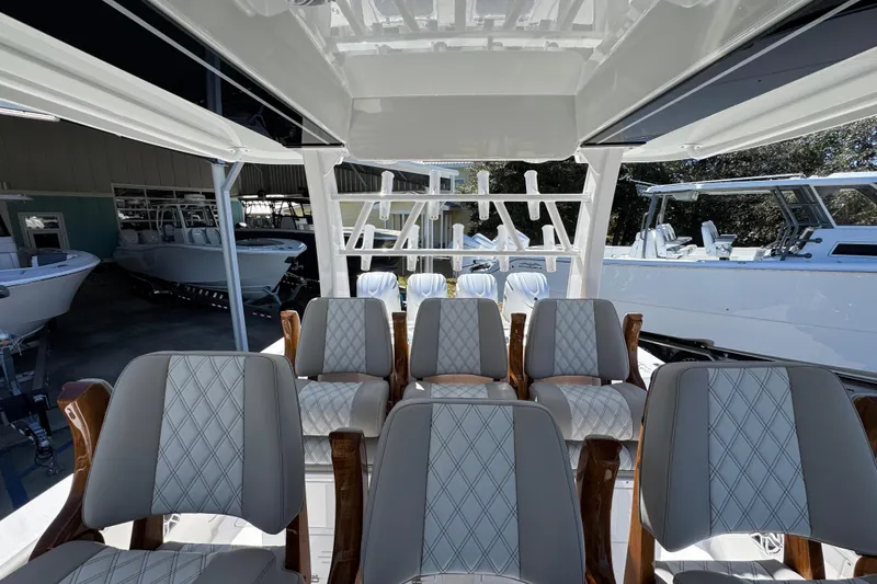 Slide: The Image of Interior view of 2027 Caymas 401 CC boat with luxurious seating and modern design. - 35