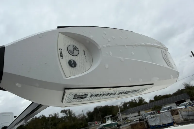 Slide: The Image of 2025 Skeeter SX241 boat with Minn Kota Quest motor, featuring pairing technology. - 25