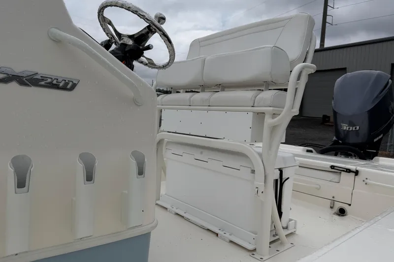 Slide: The Image of Skeeter SX241 boat 2025 with white seating and controls. - 30