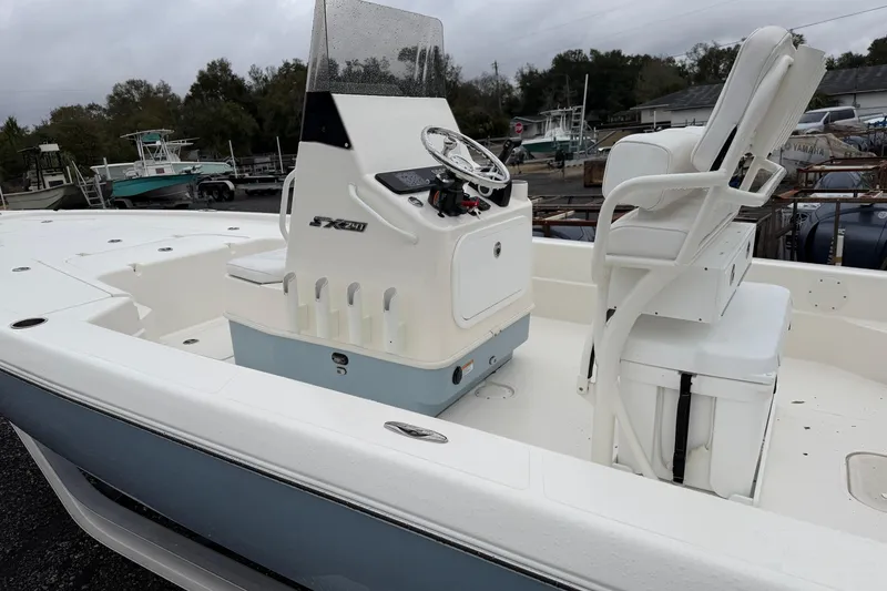 Slide: The Image of Skeeter SX241 boat 2025, interior view with console and seating. - 33