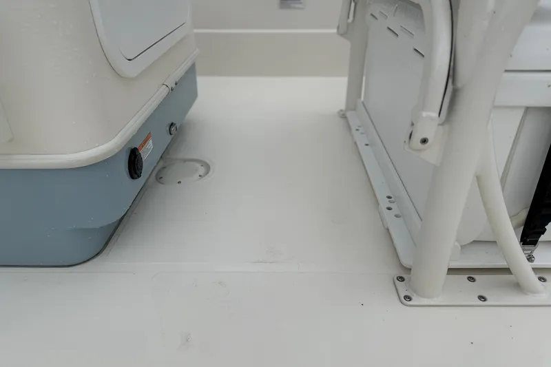 Slide: The Image of 2025 Skeeter SX241 boat interior, featuring storage compartments and seating area. - 50