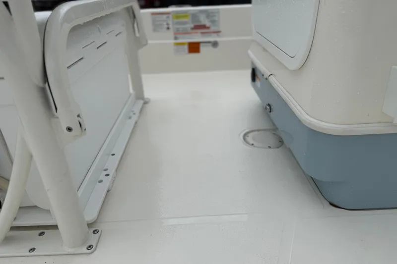 Slide: The Image of 2025 Skeeter SX241 boat interior, featuring seating and storage compartments. - 54