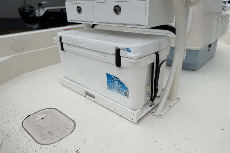Slide: The Image of 2025 Skeeter SX241 boat deck with Engel cooler and storage compartments. - 61