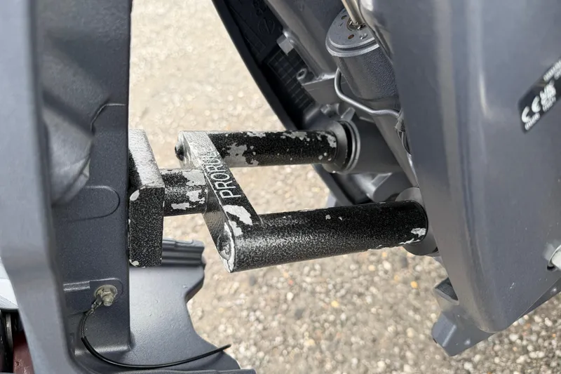 Slide: The Image of Close-up of Skeeter SX241 2025 boat engine component with visible wear. - 9