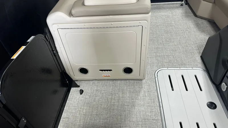 Slide: The Image of Interior of Premier 210 Sunsation 2026 with gray carpet flooring. - 27