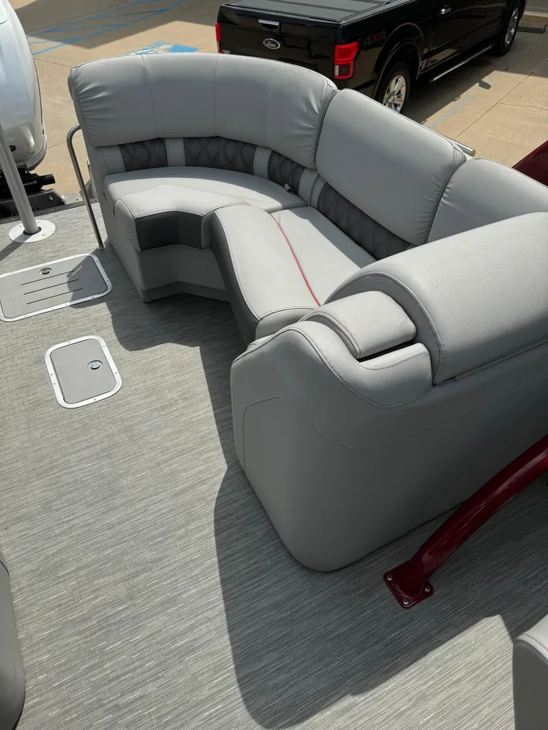 Slide: The Image of 2022 Bennington 28 QXFBA boat with luxurious gray seating. - 16