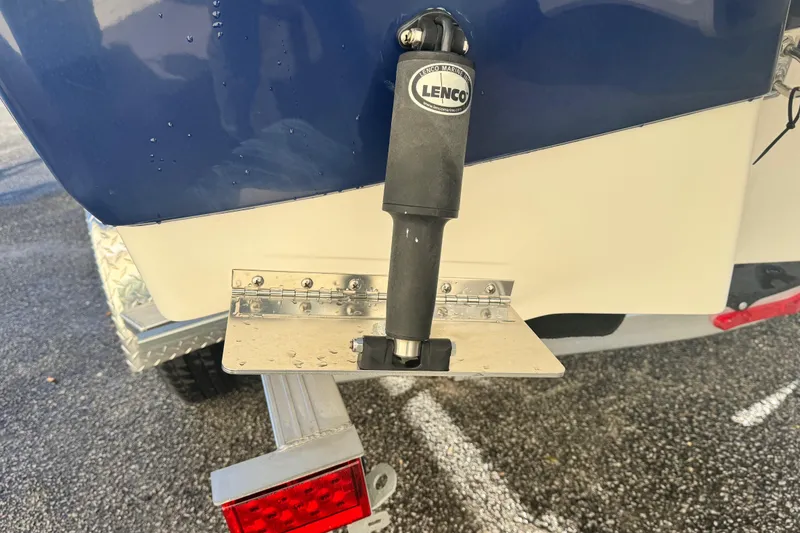 Slide: The Image of 2023 Robalo R202 Explorer boat with Lenco trim tab actuator. - 10