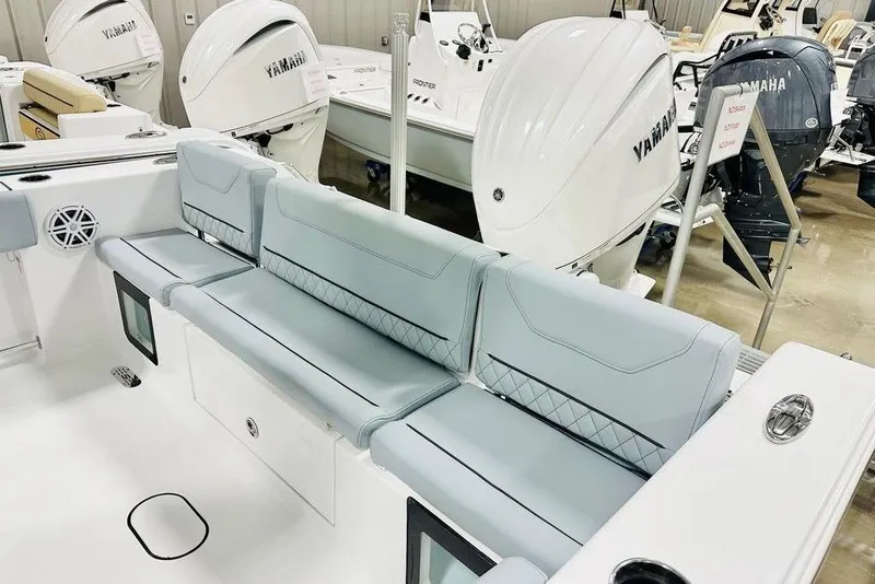 Slide: The Image of 2026 Sportsman Heritage 231 Center Console with Yamaha engines, featuring sleek seating and modern design. - 13