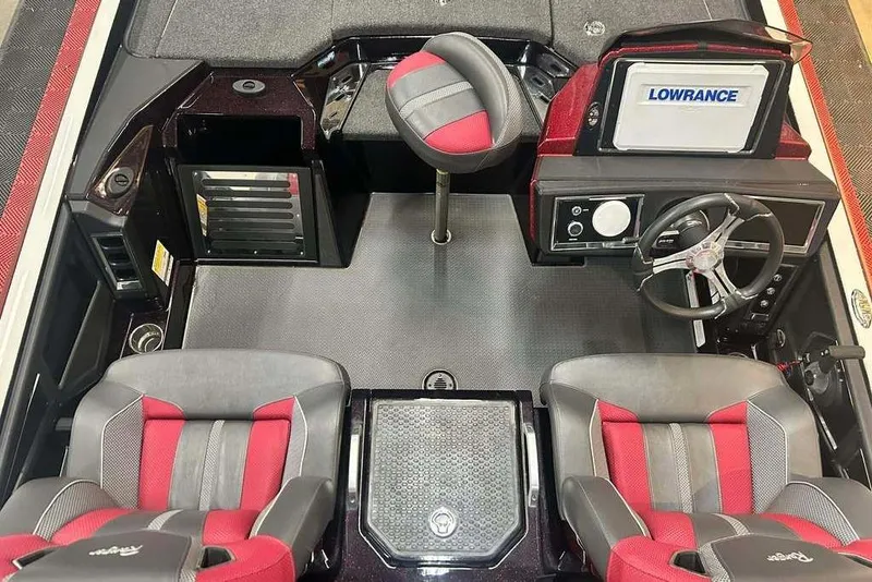 Slide: The Image of 2024 Ranger Z520R Cup-Equipped boat interior with red and gray seating, Lowrance electronics. - 4