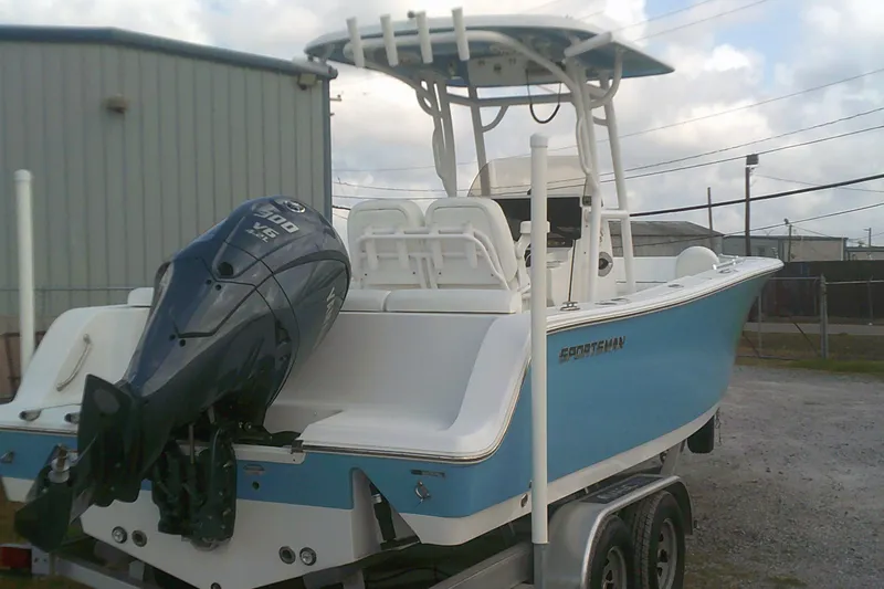 Slide: The Image of 2023 Sportsman Heritage 241 Center Console boat with Yamaha V6 engine on trailer. - 4