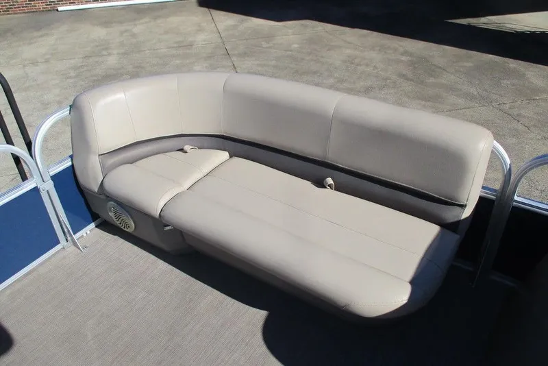 Slide: The Image of 2021 Sun Tracker Party Barge 18 DLX pontoon seating, beige upholstery, outdoor setting. - 7