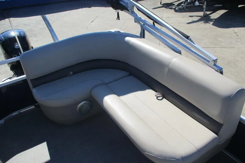 Slide: The Image of 2021 Sun Tracker Party Barge 18 DLX interior seating with beige upholstery. - 8